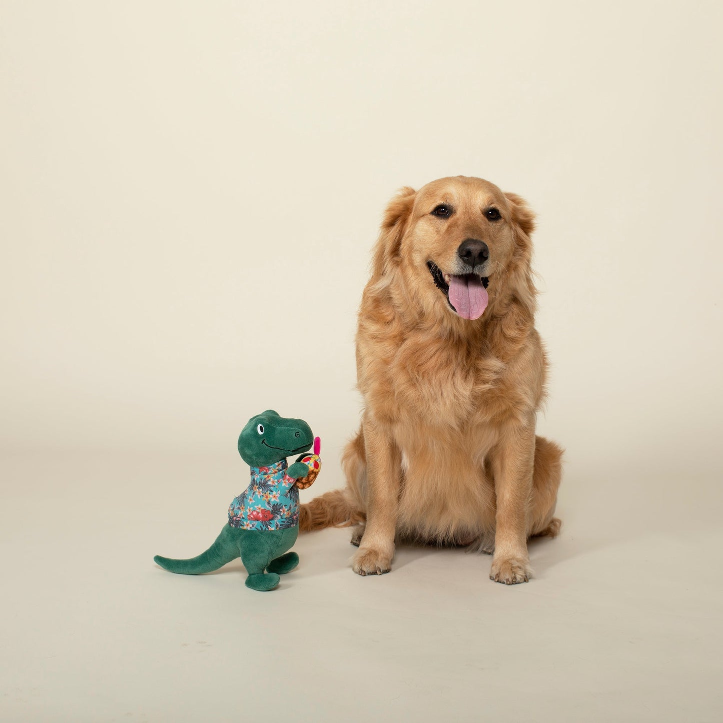 Fringe Studio It's 5 O'Clock Somewhere tropical plush squeaky dog toy with a dog