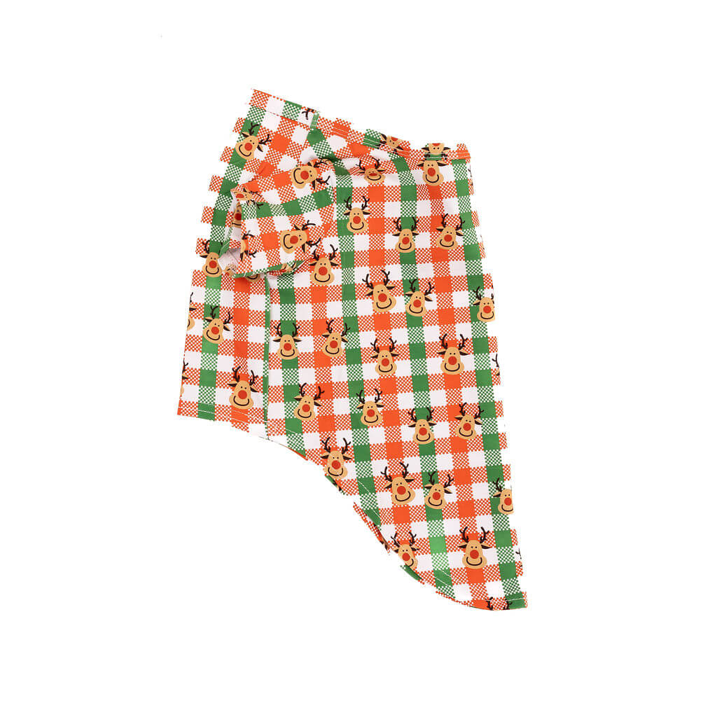 A side flat lay of a Vibrant Hound Reindeer Christmas shirt for dogs. The shirt has green, red, and white cheekers with reindeer printed on it.
