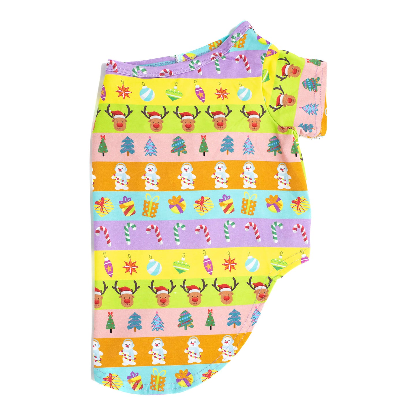 Side profile flat lay of VIbrant Hound's Electric Energy shirt for dogs. It is green, orange, pink, and purple stripes with reindeer, christmas trees, snowmen and christmas decorations printed on it.