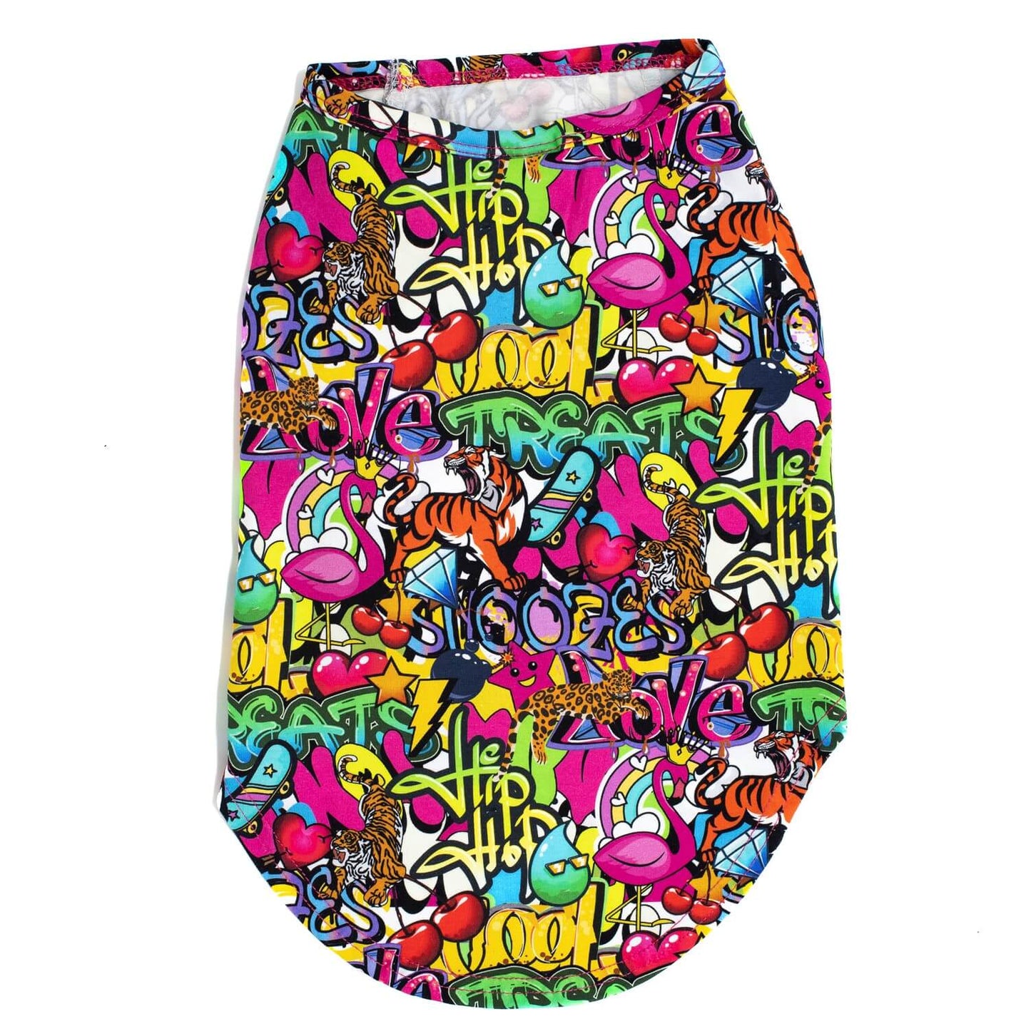 A back flat-lay of Vibrant Hound's Writting on the wall shirt for dogs. It is covered in a bright coloured graffiti print featuring Skate boards, lions, tigets and flamingos.