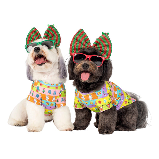 Two Havanese dogs wearing Vibrant Hound Christmas shirts for dogs.