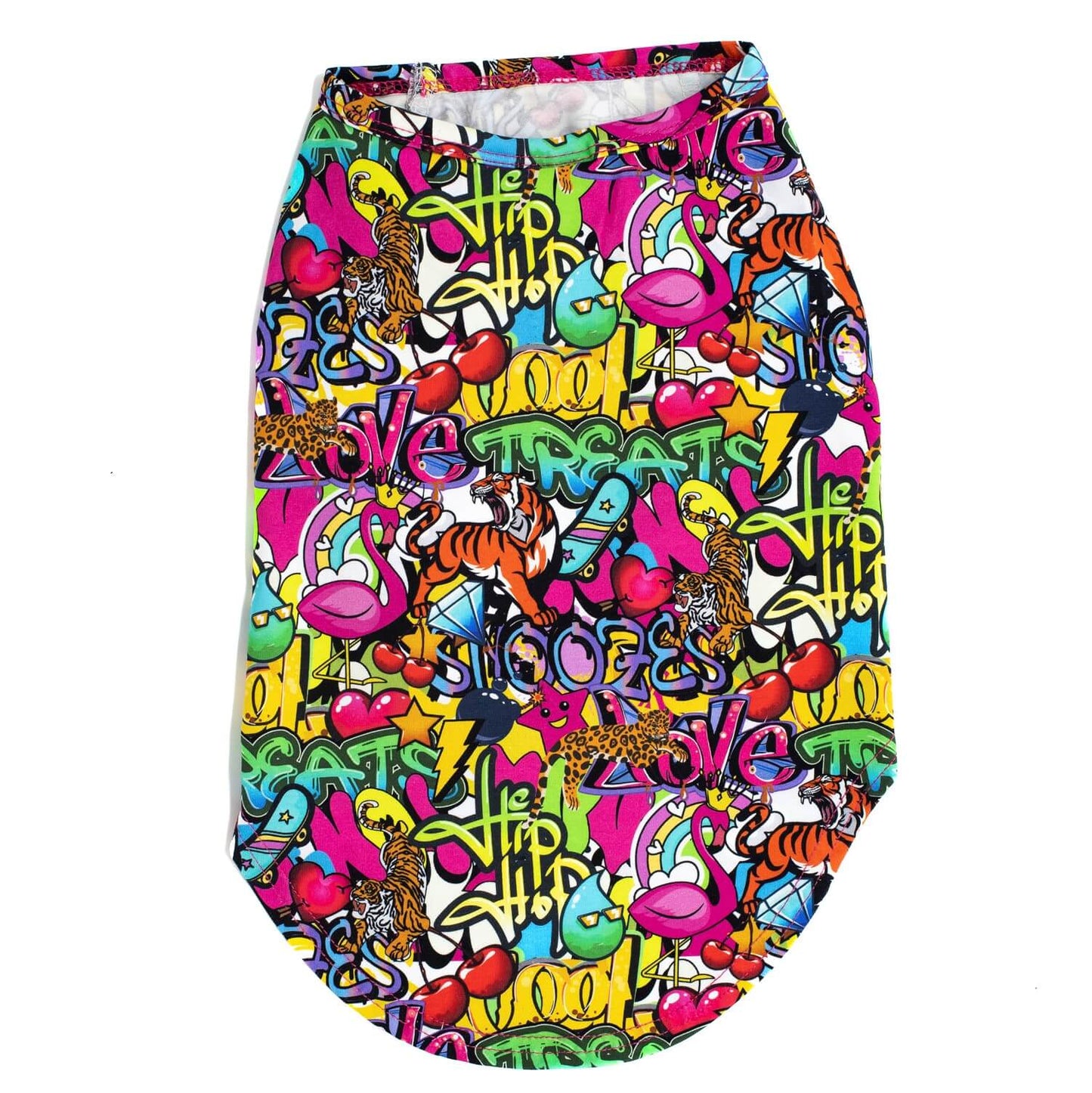 A back flat-lay of Vibrant Hound's Writting on the wall shirt for dogs. It is covered in a bright coloured graffiti print featuring Skate boards, lions, tigets and flamingos.