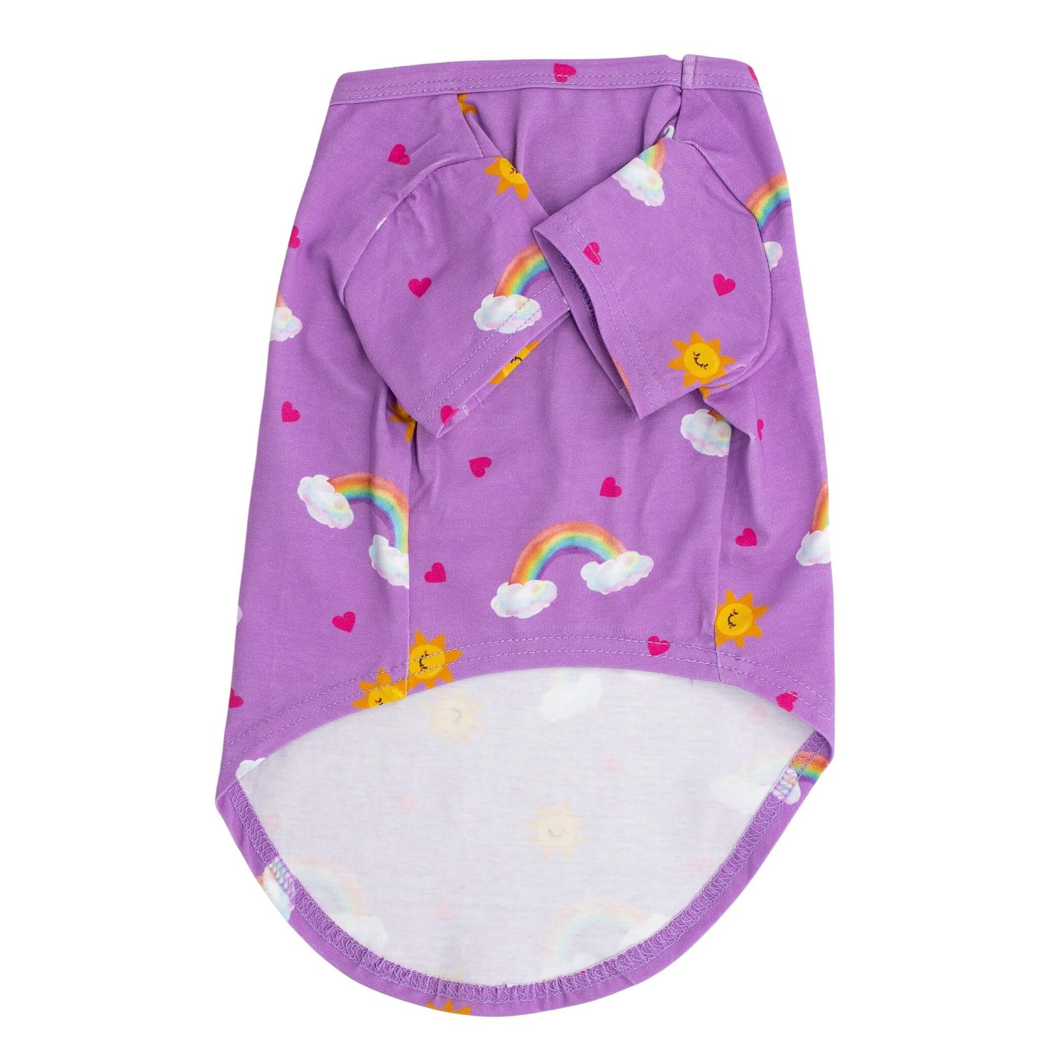 Front flat lay of Vibrant Hound's Chasing Rainbow pyjama for dogs. The dog PJs are purple with rainbows, bright suns,  and love hearts printed on it. 
