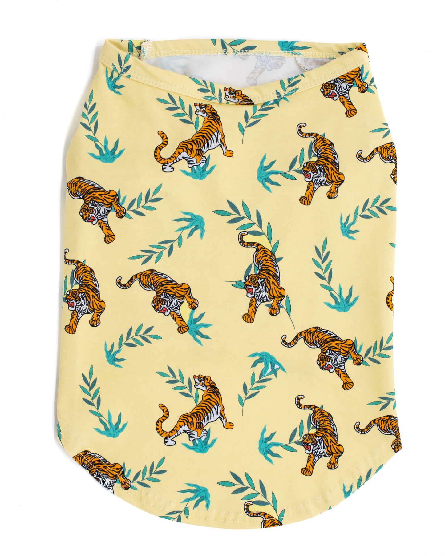Back of Wild child dog shirt. Printed with Tigers pouncing out of grass. Light yellow shirt for dogs.